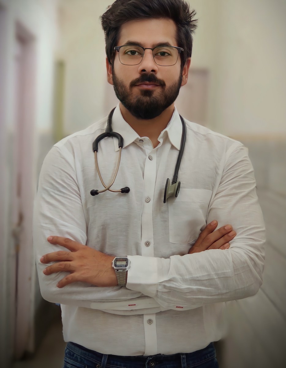 Portrait of a doctor wearing a stethoscope with arms crossed